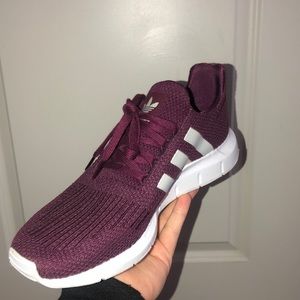 Maroon and white adidas swift run shoes